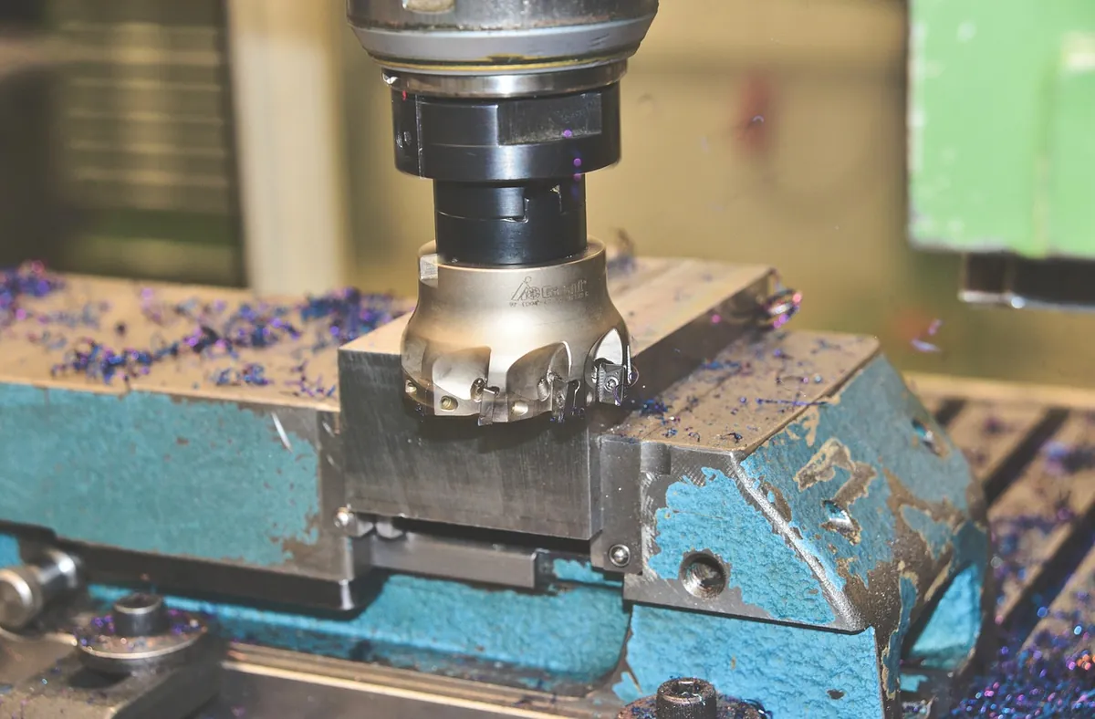 CNC milling cutter machining a metal workpiece